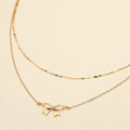 Metal Bow Pendant Accent Layered Chain Necklace